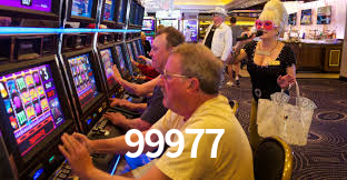 99977